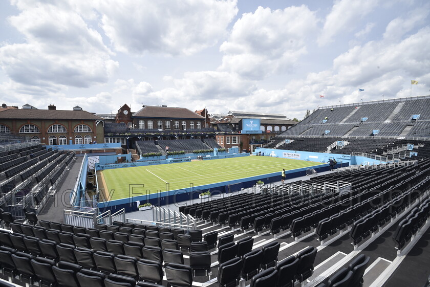 Queens tennis 
 Shot of centre court at the Queens tennis championship, held in London England. 
 Keywords: tennis, queens tennis, tennis london, sport, photography, centre court,