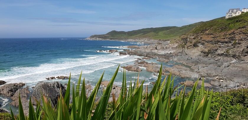 Woolacombe-not-Algarve 
 View of Morthoe in Devon 
 Keywords: Devon, woolacombe, morthoe, landscape, seas, cliff, cliff edge, summer, waves, rocks, England, uk,