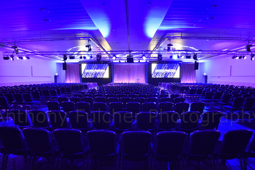 Conference room 
 Room all set up for a conference session 
 Keywords: conference, seminar, venue, purple, event, event photography,