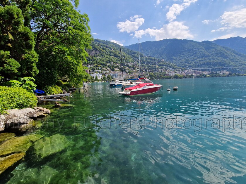 Clearwater 
 How clear is that water, a boat moored on Lake Geneva, France. 
 Keywords: boat, lake, water landscape, summer, france, geneva, clear, blue,