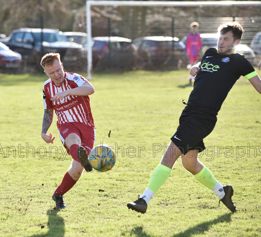 U21s-football-(1) 
 Going in for the tackle, 2 players wincing at the challenge. 
 Keywords: football, youth, u21s, soccer, tackle,