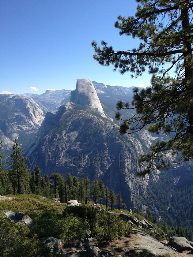 Half dome 
 Taken from a different angle here is Half dome from glacier point in Yosemite national park in the USA 
 Keywords: half dome, USA, California, national park, glacier point, summer, landscape, travel,