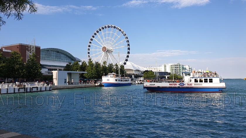 TAXIIIII 
 Water taxis in Chicago, USA 
 Keywords: taxi, water taxi, landscape, water, sea, lake, chicago, michigan,